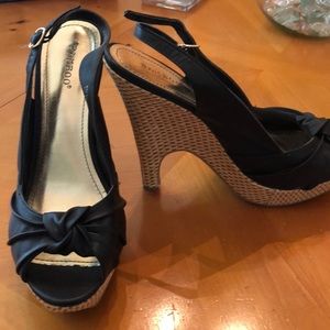 Black and Wicker platforms